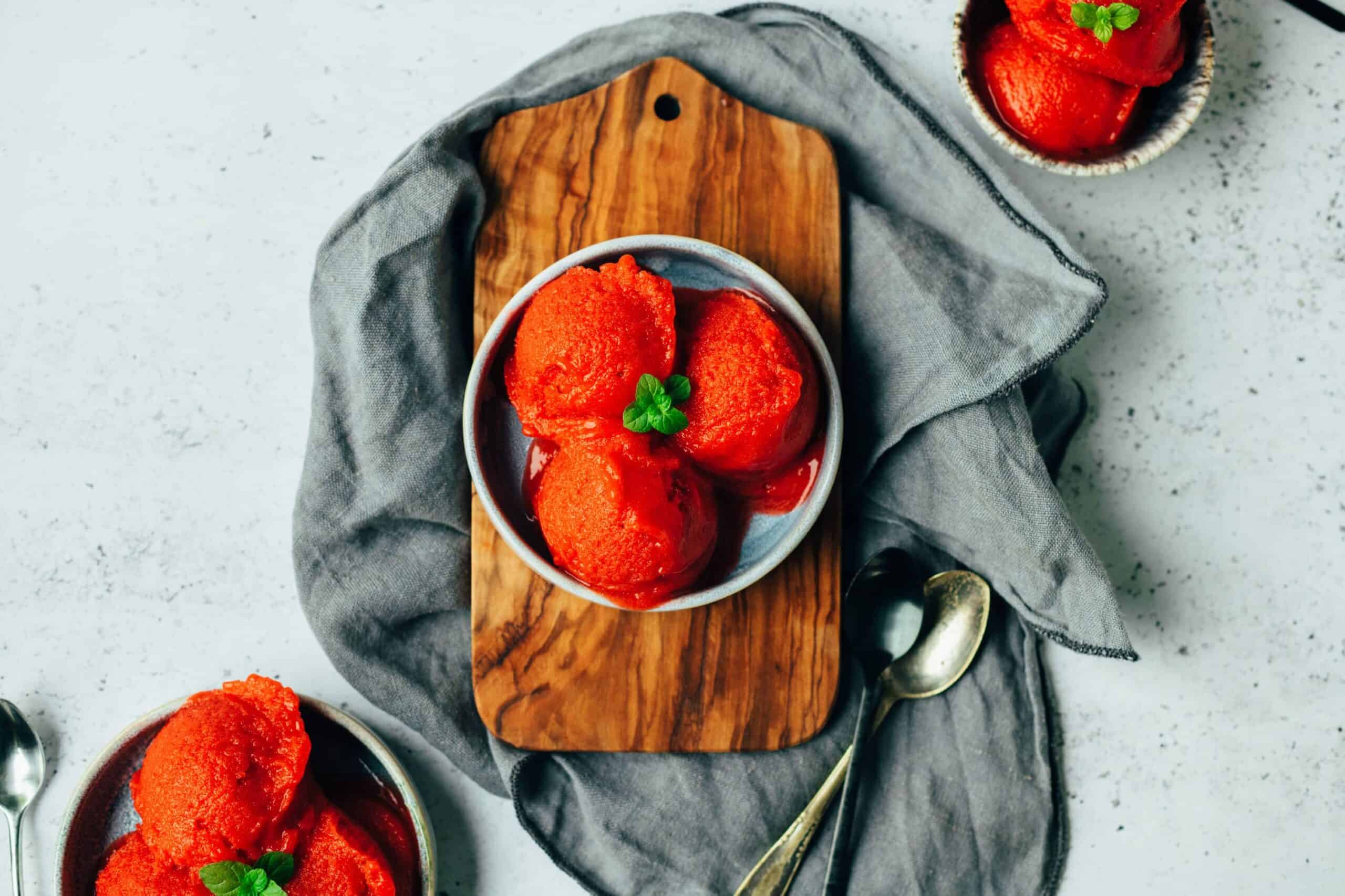 Premium Photo  Scoop of craveworthy frozen strawberry sorbet with velvety  texture macro shot summer dessert healthy sugar free sweets